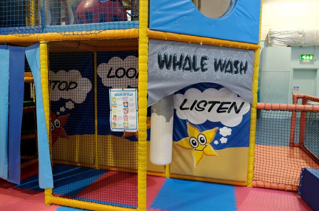 Inside Centre AT7 Creche play area colourful soft play flooring and netting