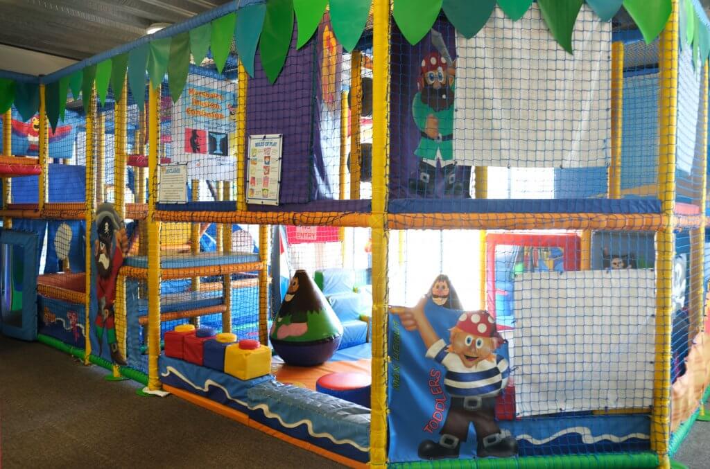 Inside Xcel Leisure Centre Creche play area colourful soft play flooring and play shapes
